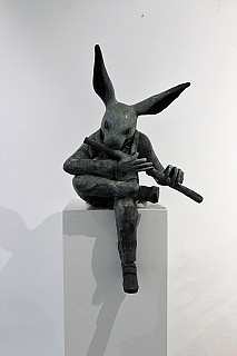 rabbit playing flute rac0031